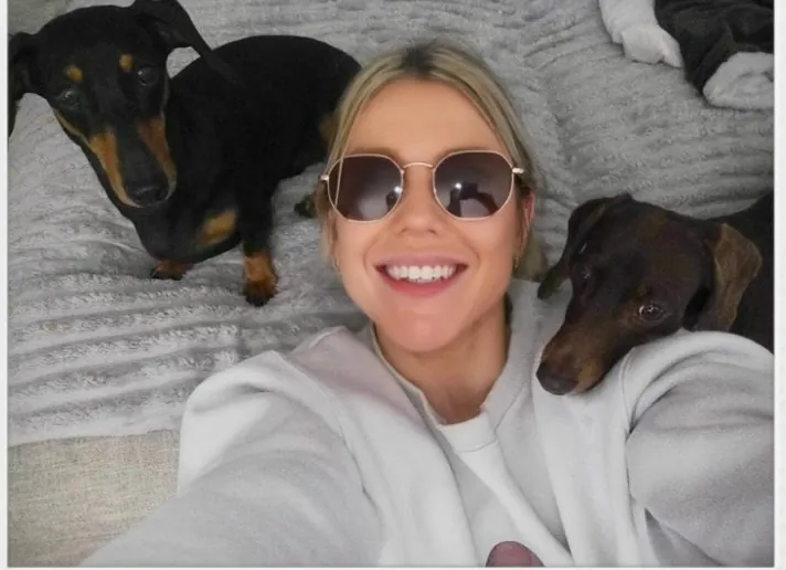 Ash with her dachshunds