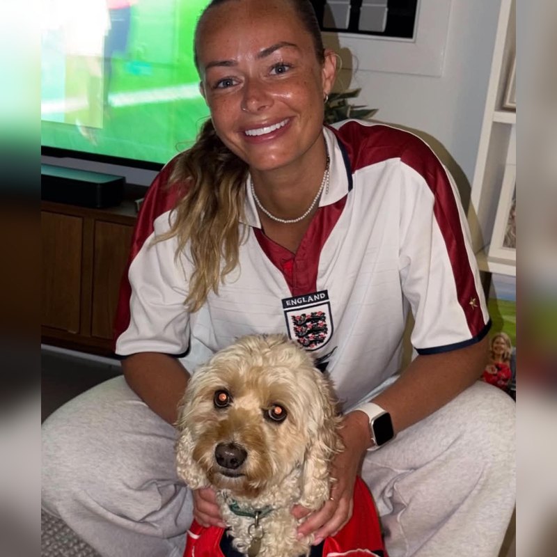 Brodie with her cavoodle Nuggett