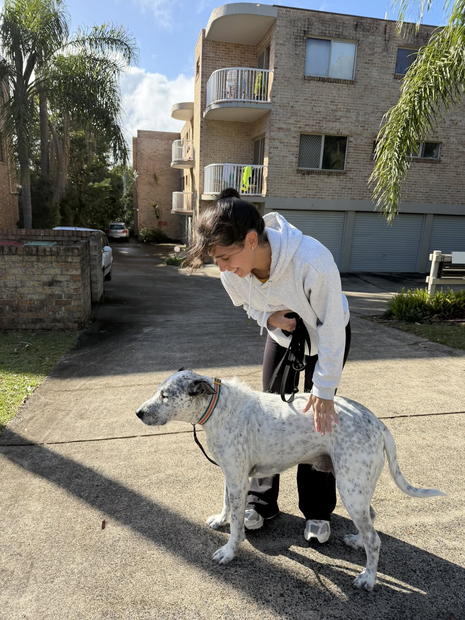 Coni with a dog on a walk